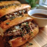 Irresistible Slow Cooker Ground Beef French Dip Sandwiches