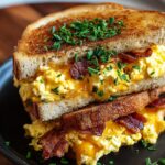 Ultimate Breakfast Grilled Cheese with Scrambled Eggs and Bacon