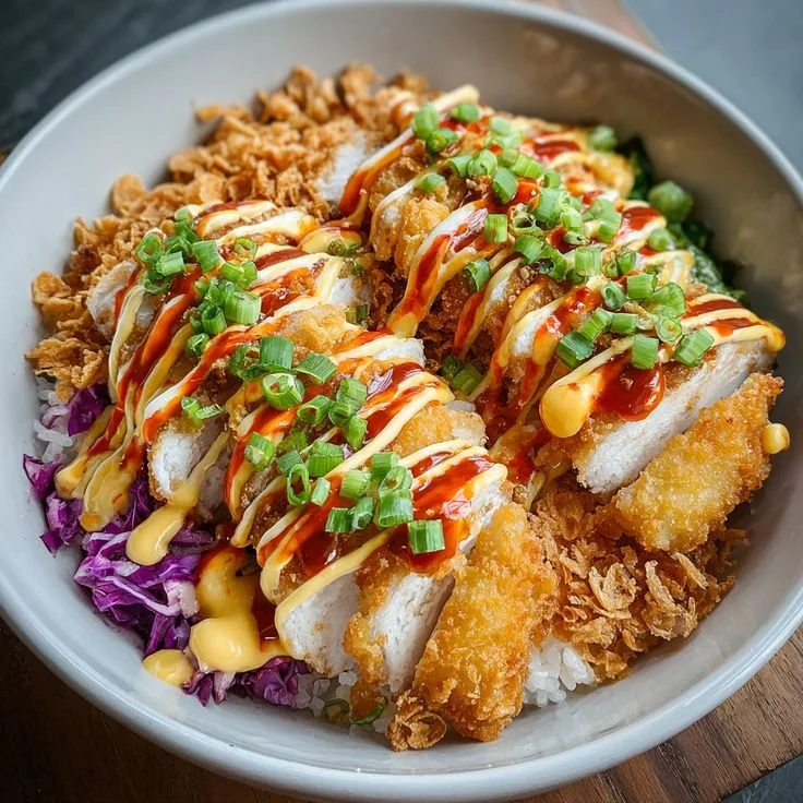 Bang Bang Chicken Bowl with creamy sauce and crispy toppings